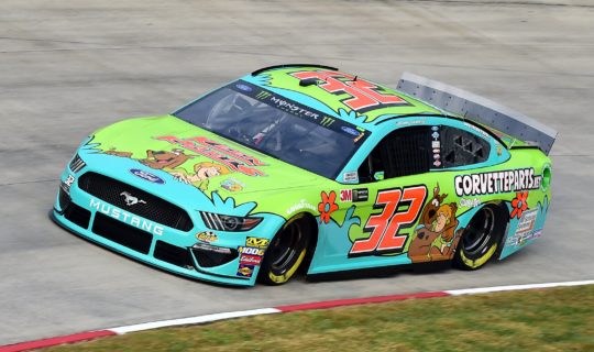 On track photo of the Scooby-Doo paint scheme for NASCAR driver Corey LaJoie